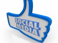 The words Social Network on a blue thumb's up symbol to illustrate a group of colleagues or organized peer community with common interests and likes