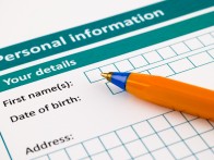Personal information form with ballpoint pen